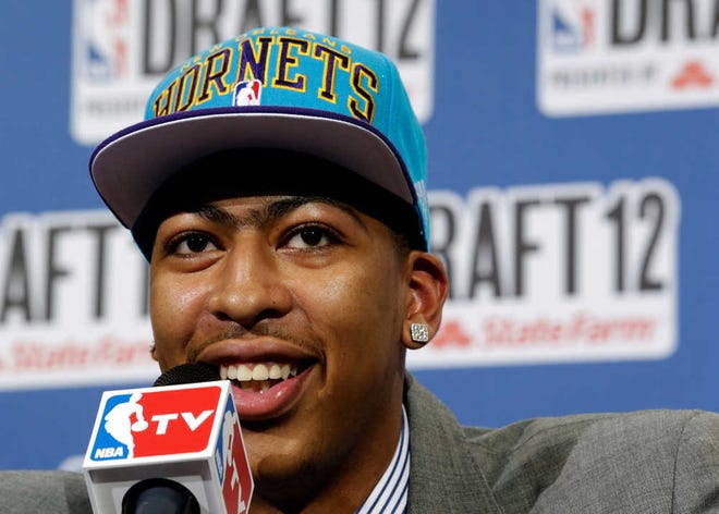 Kentucky's Anthony Davis smiles as he answers questions from reporters after being drafted No. 1 by the New Orleans Hornets Thursday during the NBA Draft.