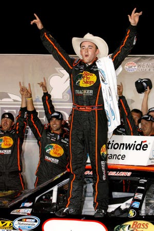 Austin Dillon celebrates his win in the NASCAR Nationwide Series auto race at Kentucky Speedway, Thursday, June 28, 2012, in Sparta, Ky. (AP Photo/Autostock, Matthew T. Thacker) MANDATORY CREDIT