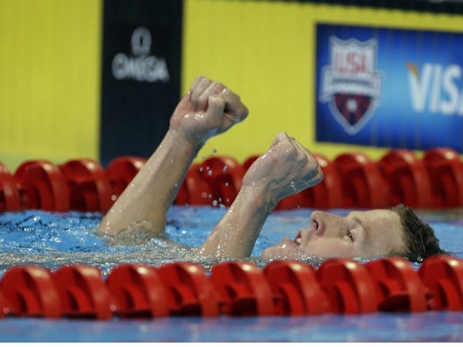 Scott Weltz celebrates after winning the men's 200-meter breaststroke final at the U.S. Olympic swimming trials on Friday, June 29, 2012, in Omaha, Neb.