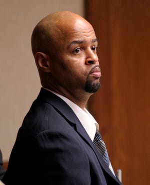 Dickie Anderson, Jr. watches as the prosecution presents evidence during his trial in Connecticut Superior Court Tuesday, March 13, 2012. Anderson is charged with murder for the 1997 and 1998 deaths of Renee Pellegrino and Michelle Comeau in Waterford and Norwich.