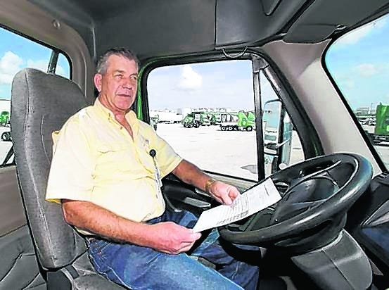 Bobby Costine, a driver for Publix, in the cab of his truck at the warehouse complex in Lakeland. Costine is in his 36th year of safe driving.