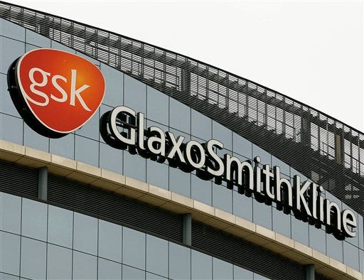 This Wednesday, April 28, 2010, file photo. shows the GlaxoSmithKline offices in London. GlaxoSmithKline LLC will pay $3 billion and plead guilty to promoting two popular drugs for unapproved uses and to failing to disclose important safety information on a third in the largest health care fraud settlement in U.S. history, the Justice Department said Monday, July 2, 2012. (AP Photo/Kirsty Wigglesworth)