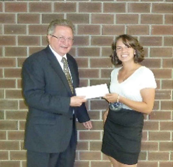 Submitted Photo - Melissa Calascibetta of Kittatinny Regional High School is awarded by club representative Paul Adams.