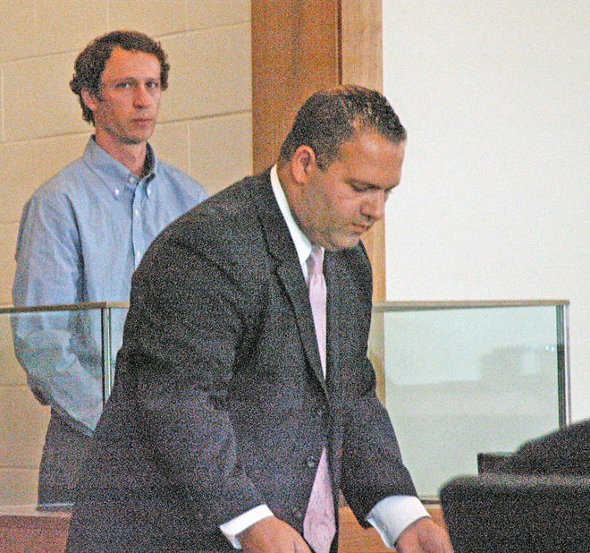 Patrick Doyle, left, appears with his lawyer Lefteris Travayiakis Tuesday in Taunton District Court.