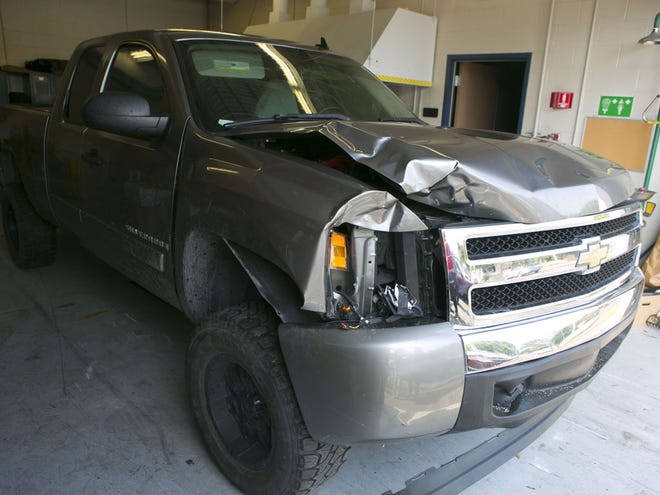 This is the 2007 Chevy Silverado believed to be used in the fatal hit and run that killed Gabrielle Rush, 22, on Southwest 20th Street early Saturday morning. The truck is shown in the evidence bay at the Ocala Police Department in Ocala, FL on Tuesday July 2, 2012.