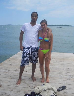 Lamar Thompson and his friend on the pier at Hough's Neck Saturday.