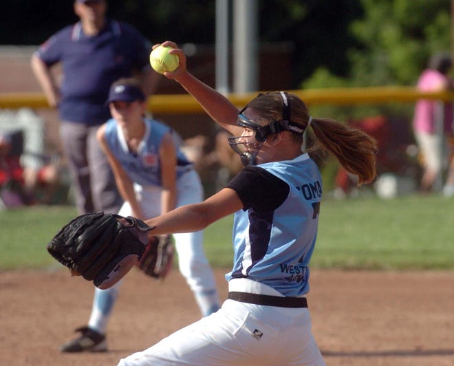 Norwich-Preston’s Bailey Comeau fires in a pitch against Jewett City on Monday during the District 11 9-10-year-old softball championship in Norwich.