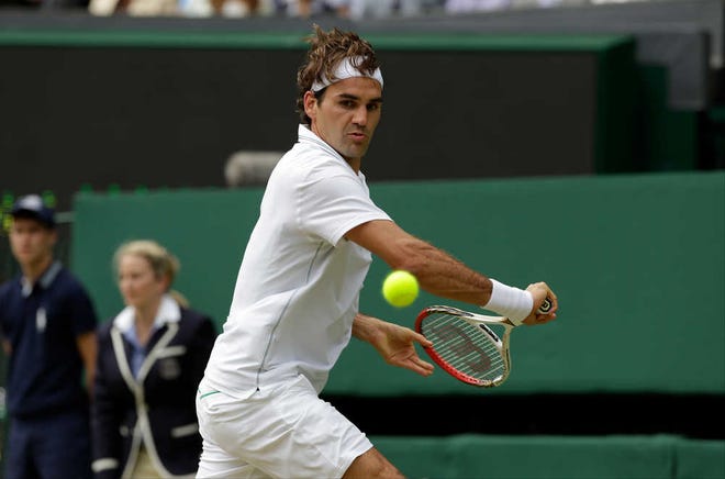 Roger Federer of Switzerland during a quarterfinals match against Mikhail Youzhny of Russia at the All England Lawn Tennis Championships at Wimbledon, England, Wednesday July 4, 2012. (AP Photo/Anja Niedringhaus)