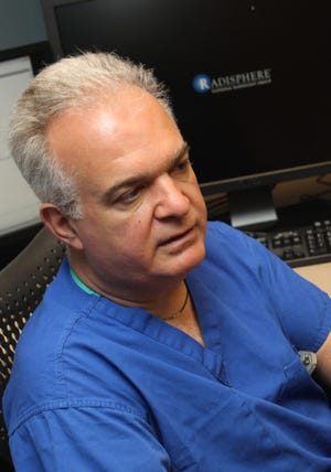 Dr. Gabriele Pedicelli talks about working for Radisphere, a national radiology group that works with community hospitals such as Wooster Community Hospital in Wooster. (Karen Schiely/Akron Beacon Journal)