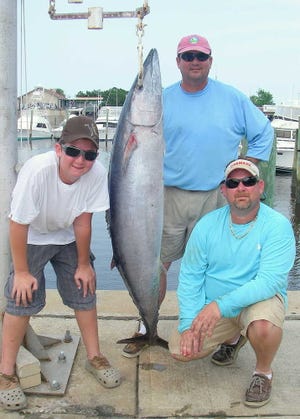 Captain Frank Strickland and crew with a 78-pound wahoo caught on light tackle at the King Buster 400 Saturday. The fight lasted 45 minutes and 1.5 miles. Photo provided