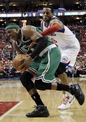The Sixers' Andre Iguodala (right) pressures the Celtics' Paul Pierce during Game 3 of the Eastern Conference semifinals.