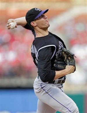 Colorado Rockies starting pitcher Christian Friedrich works in the first inning of a baseball game against the St. Louis Cardinals, Thursday, July 5, 2012, in St. Louis.(AP Photo/Tom Gannam)
