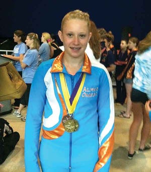 Submitted Photo - Sparta gymnast Marin Sheridan is a gold medalist champion at the state level.