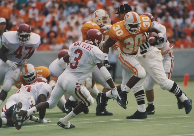A victory over Tennessee was one of the few bright spots for the Arkansas football team in 1992, its first season in the SEC. Former members of the Arkansas athletic department say Missouri is better positioned for SEC success than the Razorbacks were.