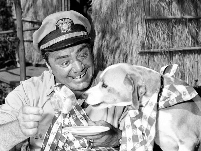 In this April 4, 1963, file photo, Ernest Borgnine acts in a scene for ABC-TV's "McHale's Navy." A spokesman said Sunday, July 8, 2012, that Borgnine has died at the age of 95. (AP Photo/File)