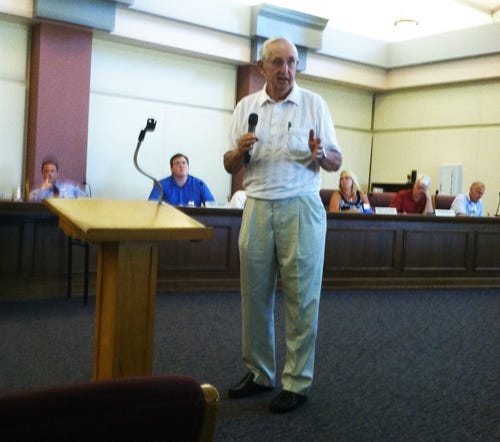 David Brandon addresses council and residents during Monday's public hearing at Stow City Hall. (Heather Beyer/Ohio.com)