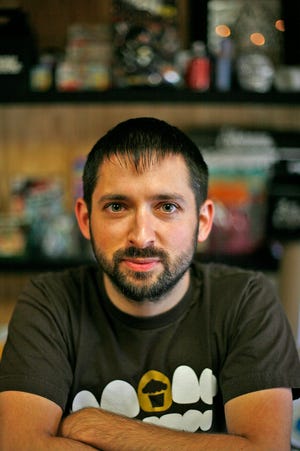 John Earle, the man behind the Johnny Cupcakes T-shirt line, at his Weymouth office.