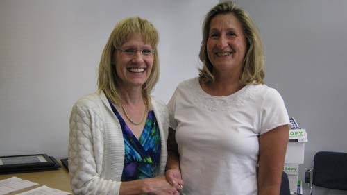 Dr. Christine Kovach (left) will be Revere's Director of Student Services, starting Aug. 1, replacing retiring Sue Chute. Kovach is welcomed to the school district by Revere Board of Education President Claudia Hower (right). (Jody Miller/Ohio.com)