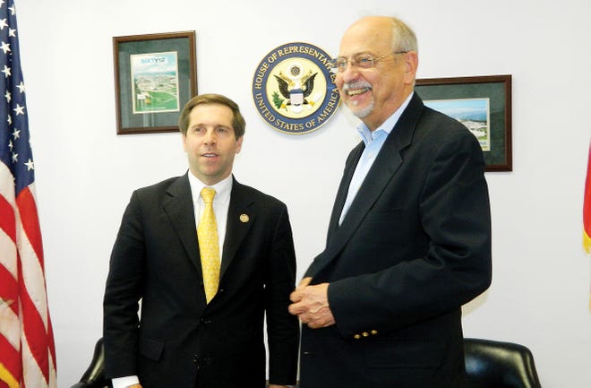 U.S. Congressmen Chuck Fleischmann and Doc Hastings talk in Fleischmann’s office at the Federal Building Friday, prior to Hastings’ tour of Oak Ridge National Laboratory, Y-12, and the East Tennessee Technology Park.