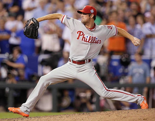 National League's Cole Hamels, of the Philadelphia Phillies, delivers against the American League during seventh inning of the MLB All-Star baseball game, Tuesday, July 10, 2012, in Kansas City, Mo. (AP Photo/Charlie Riedel)