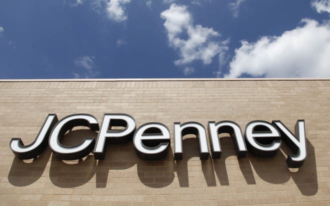 J.C. Penney Co. says Tuesday, July 10, 2012, that it is laying off 350 more workers at its headquarters in Plano, Texas, as the department store struggles to transform its business under a new CEO. (AP Photo/Sue Ogrocki)