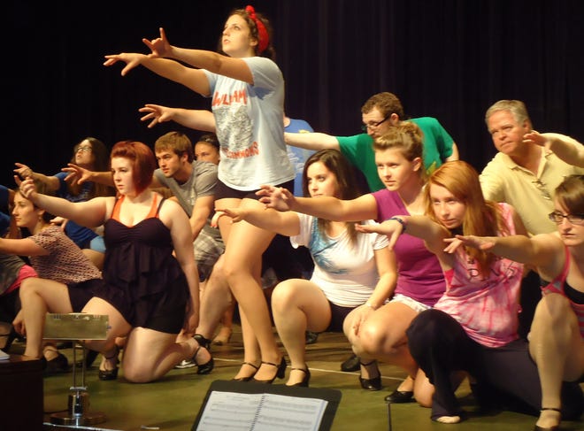 Julia Zook rehearses “All That Jazz” with the cast of “Chicago.”