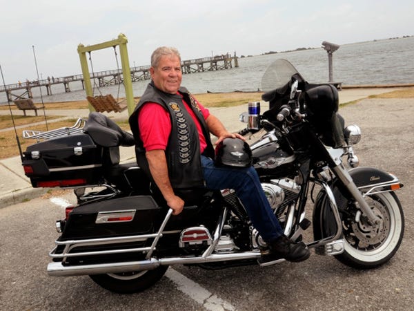 Tom Hunter, a retired homicide investigator for the New Hanover County District Attorney's Office and a retired domestic violence investigator for the Brunswick County Sheriff, will ride in a motorcycle race raising money for Hope Harbor Home.