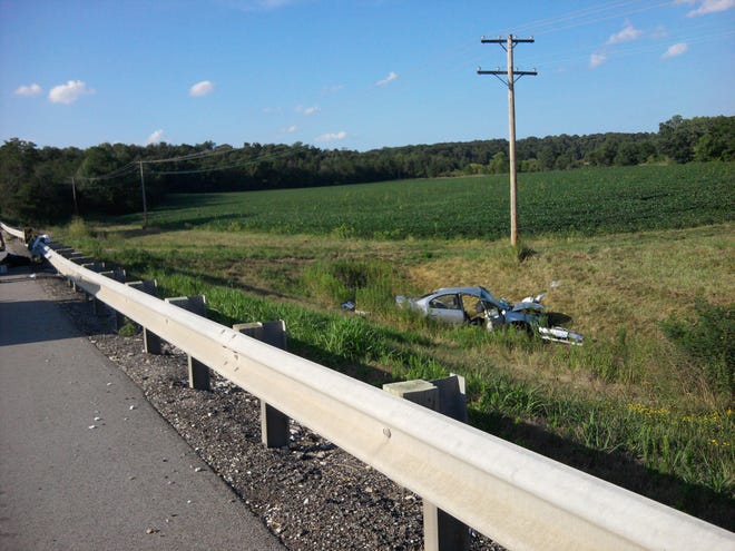 An accident occurred at around 5 p.m. Tuesday when the driver of this car went over an embankment after encountering another vehicle turning left into the driver's path. The other driver was ticketed for failure to yield while turning left.