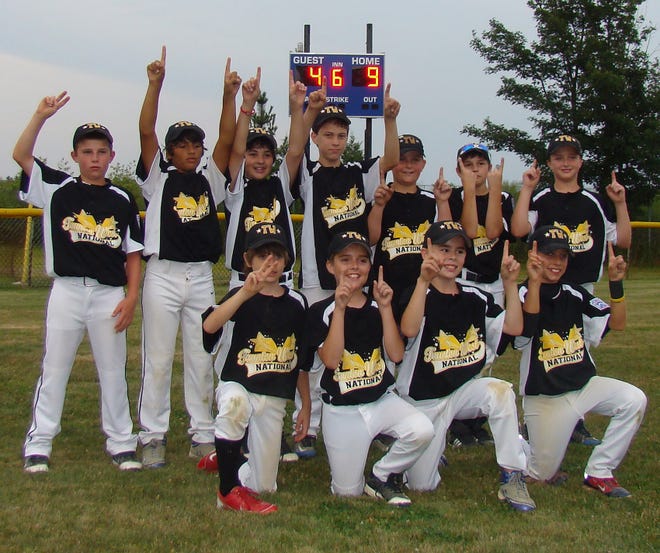 Members of the District 6 champions Taunton West National 11-year-old team after winning the championship game against Seekonk.