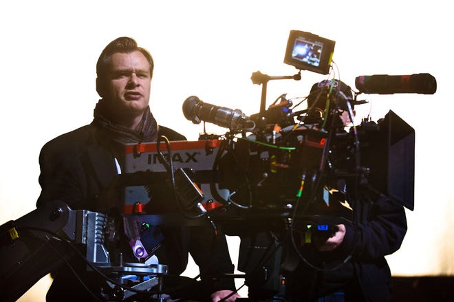 Christopher Nolan directs a scene during the filming of “The Dark Knight Rises.” The film is the final installment in Nolan’s Batman trilogy.