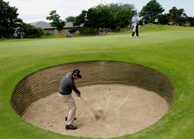 Pablo Larrazabal of Spain plays out of a bunker on the third hole during a British Open practice round Wednesday at Royal Lytham & St Annes. The tournament gets under way today.
