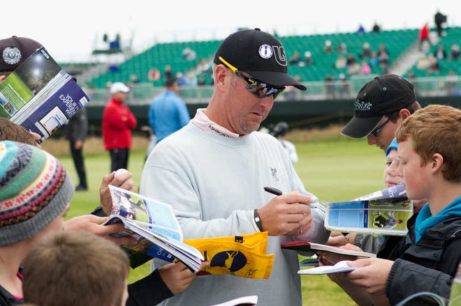 David Duval signs autographs after a practice round Tuesday at Royal Lytham & St Annes.