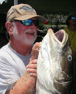 Captain Guy Spear holds up a nice cobia caught during the Kingfish Challenge last week.