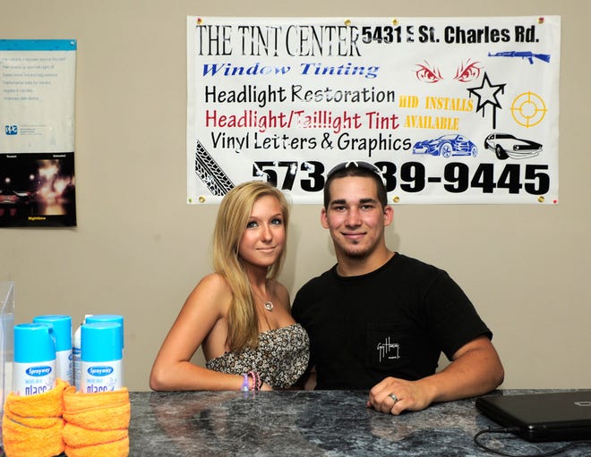 Nicholas Gomez, right, owns The Tint Center, which opened last month. Victoria Lynn works at the business at 5431 E. St. Charles Road.