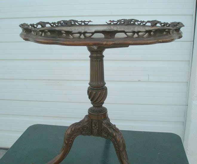 The Chippendale-style tripod tea table originated in England in the 18th century. (Courtesy of John Sikorski)