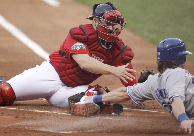 The Blue Jays’ Colby Rasmus slides safely into home past Red Sox catcher Kelly Shoppach on Friday during the first inning at Fenway Park in Boston.