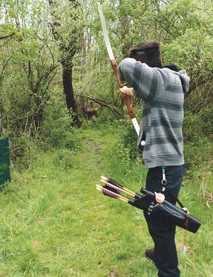 File Photo by Tracy Klimek/New Jersey Herald - Port Murry resident Benjamin Delellis aims for one of the many targets at the 23rd annual 3D target shoot in April run by the Appalachian Bowman in Green Township.