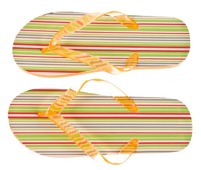 Pair of striped flip flops