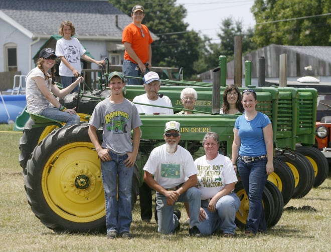The Riner family is shown with someof their tractors at the Stark Antique Power show at the Nimishillen Grange Sunday. Pictured are (front row l to r): Daniel, Jeff and Carla Ringer and Jessica Karnuth (second row) Audra Balzer (seated) Earl and Lois Ringer and Linda Balzer (back row, standing) Brianna Ringer and Luke Balzer.