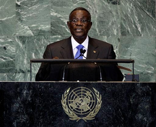 In this file photo taken on Friday, Sept. 23, 2011, President of Ghana, John Evans Atta Mills, waits to address the 66th session of the United Nations General Assembly. State-run television in Ghana is announcing on Tuesday, July 24, 2012, that President John Atta Mills has died at age 68. (AP Photo/Richard Drew, file)