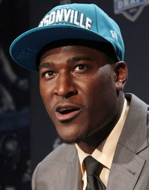 FILE - This April 26, 2012 file photo shows Justin Blackmon after being selected as the fifth pick overall by the Jacksonville Jaguars in the first round of the NFL football draft at Radio City Music Hall in New York. Blackmon has pleaded guilty to drunken driving in Oklahoma in a deal that avoids jail time. Defense attorney Cheryl Ramsey entered the plea for Blackmon during a hearing Tuesday, July 24, 2012, in Stillwater, Okla., that he did not attend. (AP Photo/Mary Altaffer, File)