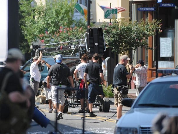 Filming on the television show "Revolution" continued along Front Street in downtown Wilmington on Tuesday, July 24, 2012.