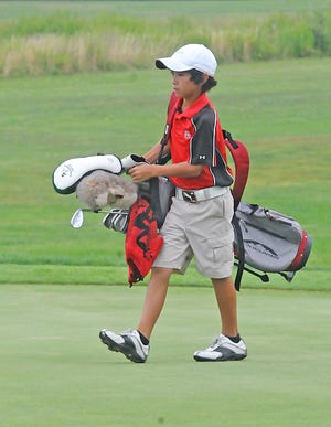 Davis Chatfield approaches one of the greens on the John F. Parker Municipal Golf Course during Tuesday's final round of the Taunton Junior City Open. Davis Chatfield won the Division II competition.