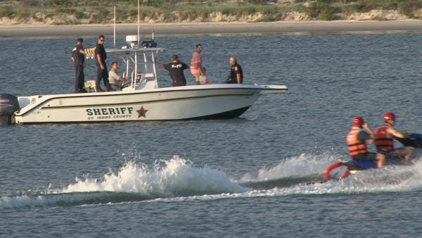 A marine rescue crew searches for a man who was reported missing near the Conch House on Thursday evening.