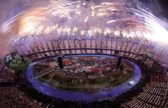 Fireworks explode over the stadium at the end of the Opening Ceremony of the 2012 Olympic Summer Games on Friday in London.