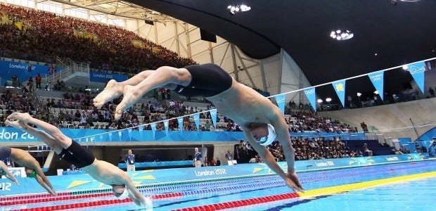United States swimmer Ryan Lochte dives off of the starting block during the men's 400-meter individual medley event during the 2012 Summer Olympics at the Aquatics Centre in London on Saturday in London.