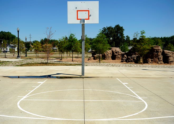 One of three basketball hoops at the Glen Oak Learning Center playground that have had their hoops removed. The hoops were removed by District 150 officials who were concerned about unruly people congregating at the school
