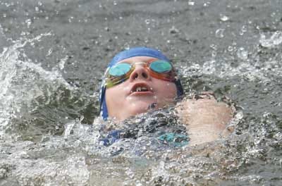 Abbey Gardner, of the Kittatinny Barracudas, swims the girls 7-8 25-meter backstroke. Gardner won this event in a time of 22.94 and the butterfly on Saturday to help Kittatinny claim its sixth straight team title.