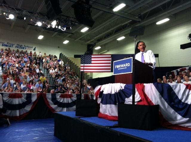 President Obama speaks to the crowd at Oyster River High School Monday June 25 afternoon.