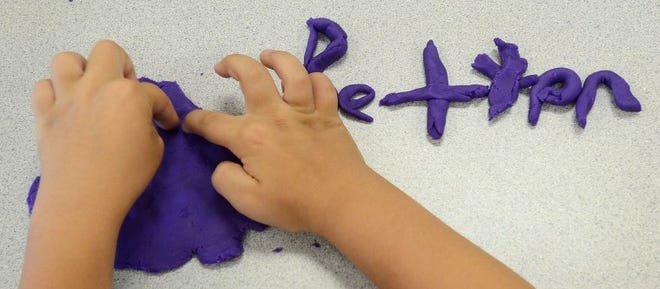 Creating the word 'better' out of play dough was Thomas Gallo, 8, from Riverside. He is taking part in the YMCA of Burlington and Camden Counties summer literacy program held at Riverside Elementary School.